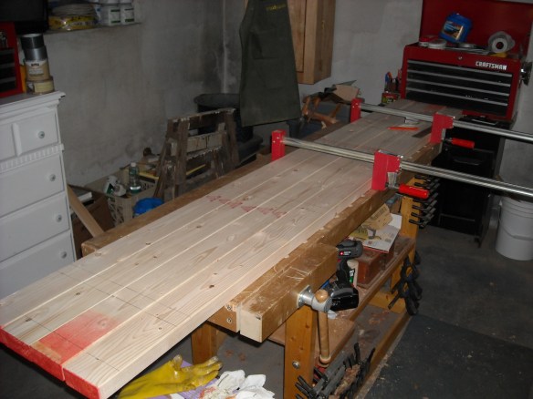 Laying out the boards for the pea fences.