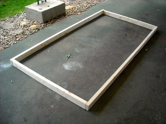 Positioning the wood for the frame.